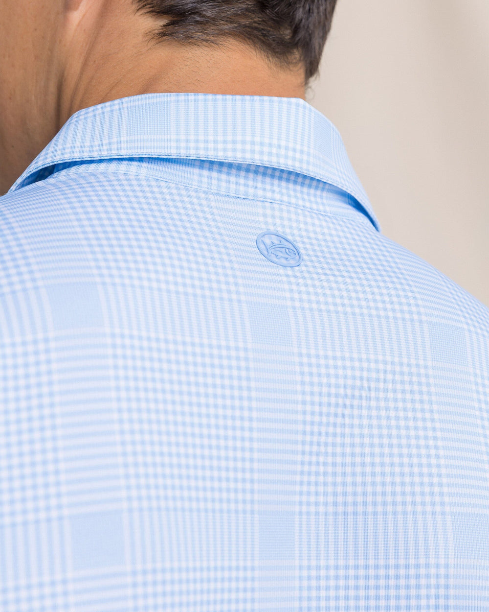 The detail view of the Southern Tide Driver Coral Key Plaid Printed Polo by Southern Tide - Ocean Channel