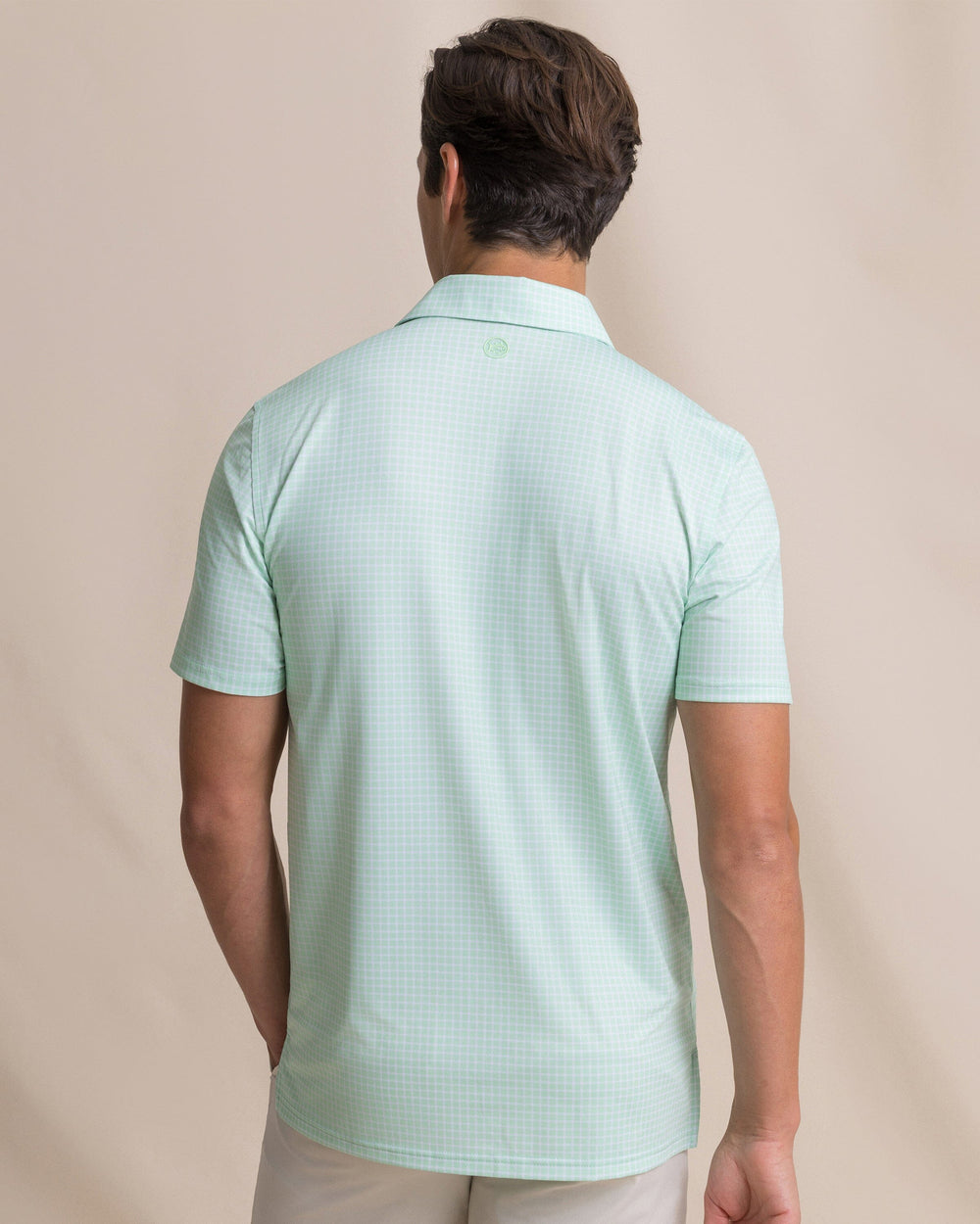 The back view of the Southern Tide Driver Dunes Edge Plaid Polo by Southern Tide - Green Ash