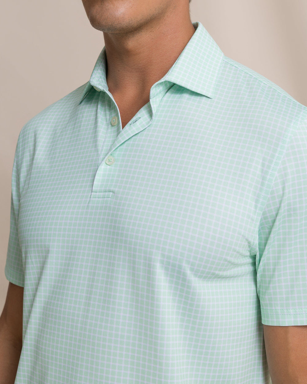 The detail view of the Southern Tide Driver Dunes Edge Plaid Polo by Southern Tide - Green Ash