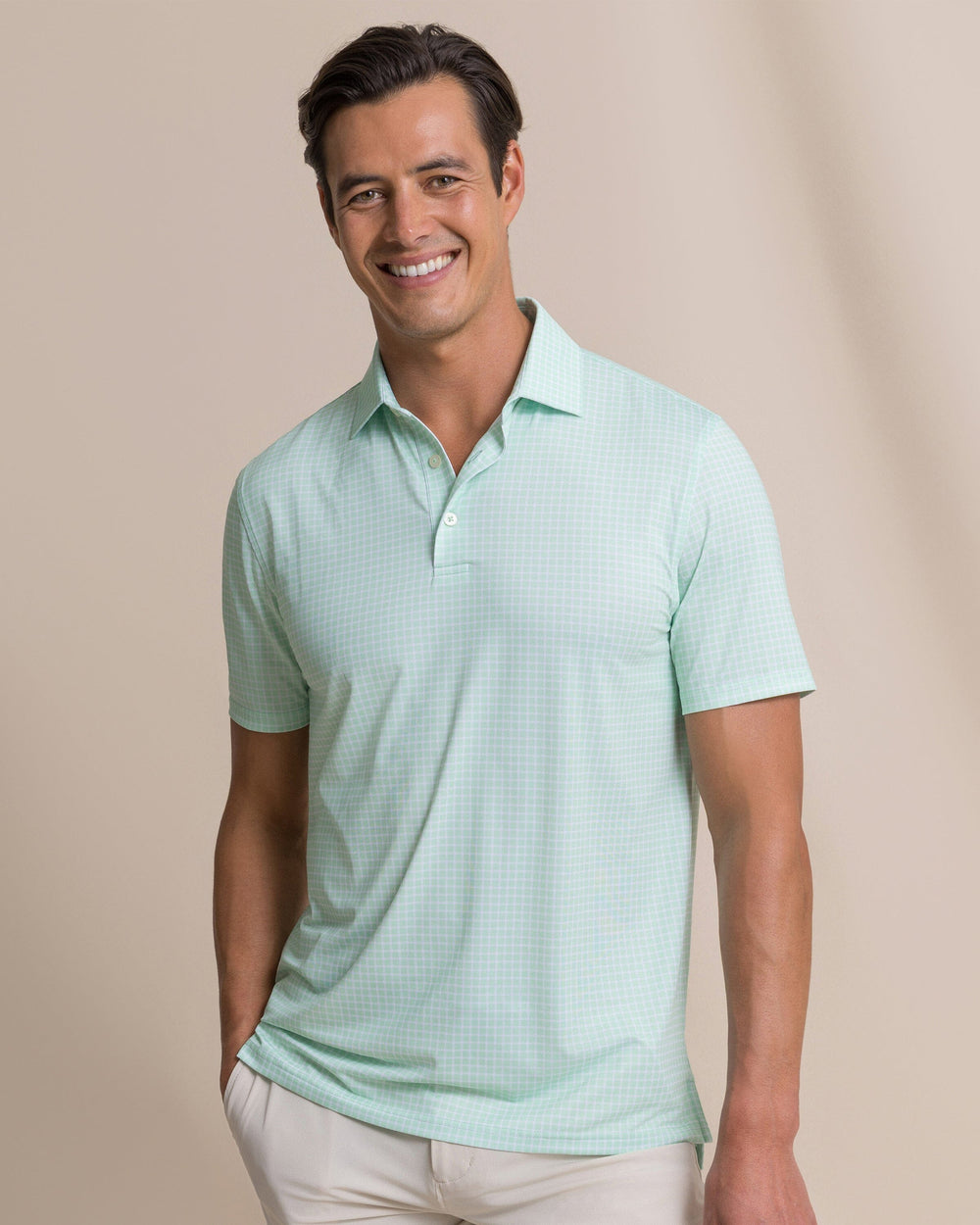 The front view of the Southern Tide Driver Dunes Edge Plaid Polo by Southern Tide - Green Ash