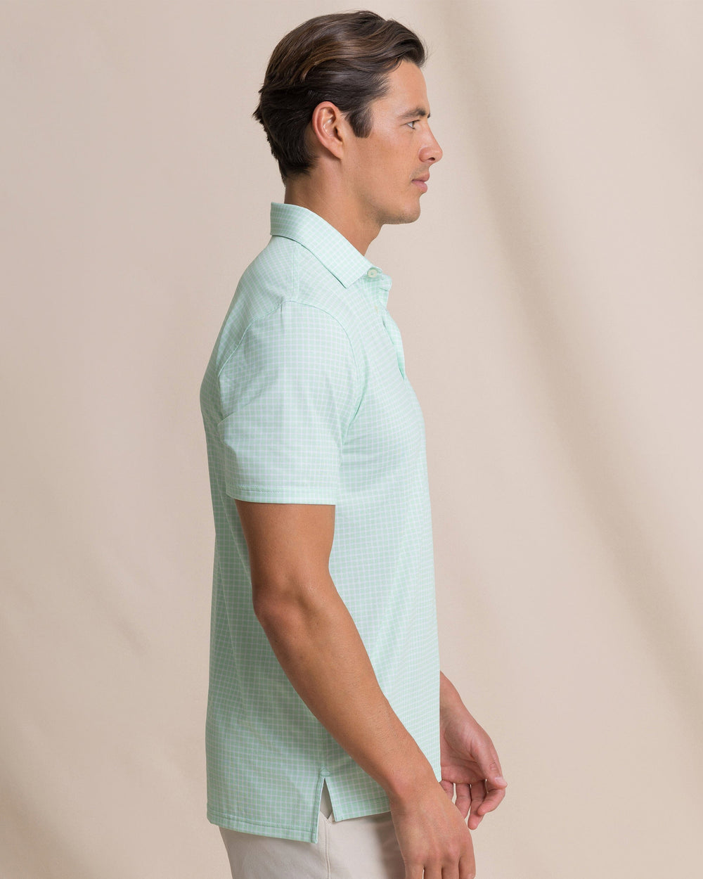 The side view of the Southern Tide Driver Dunes Edge Plaid Polo by Southern Tide - Green Ash
