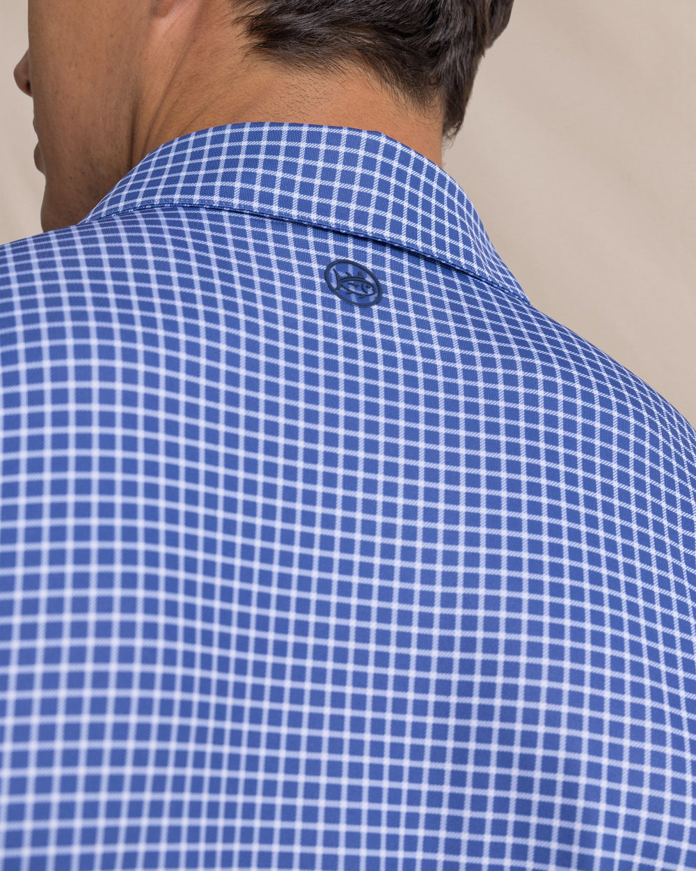 The detail view of the Southern Tide Driver Dunes Edge Plaid Polo by Southern Tide - Nautical Blue
