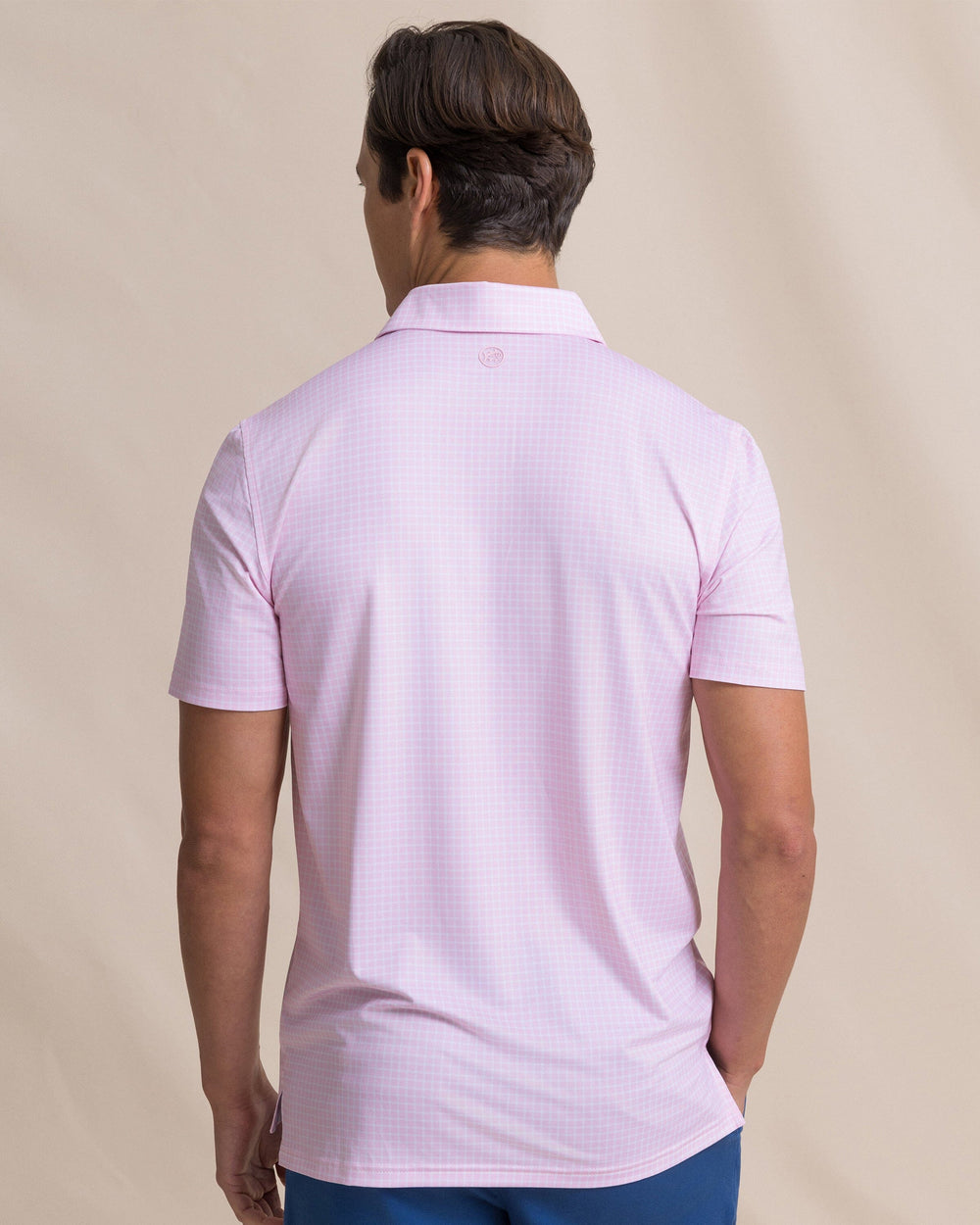 The back view of the Southern Tide Driver Dunes Edge Plaid Polo by Southern Tide - Orchid Pink