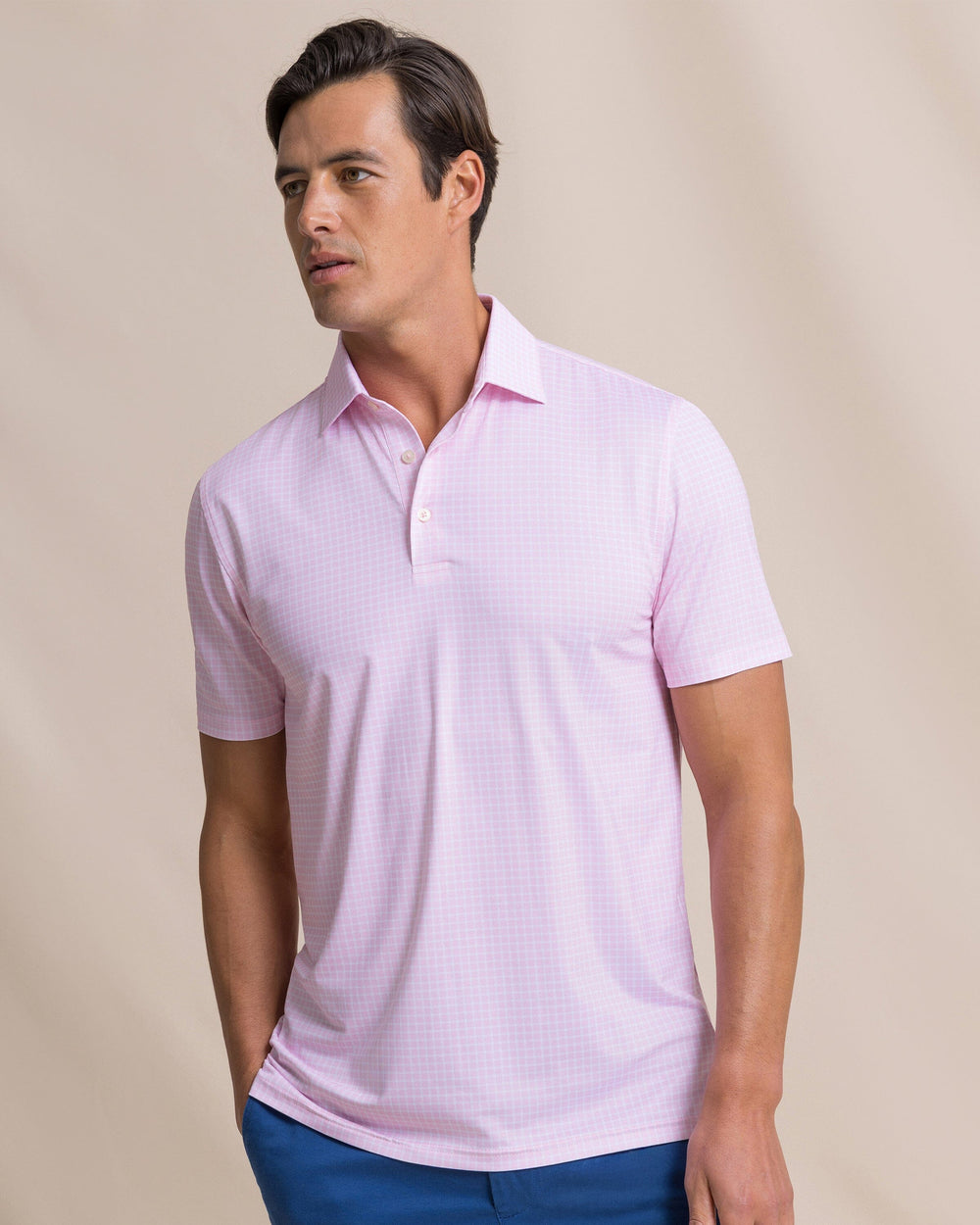 The front view of the Southern Tide Driver Dunes Edge Plaid Polo by Southern Tide - Orchid Pink