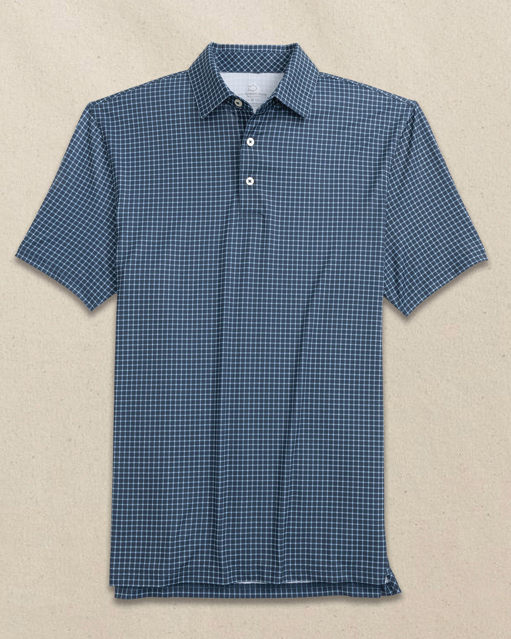 The front view of the Southern Tide Driver Dunes Edge Team Colors Plaid Polo by Southern Tide - Navy