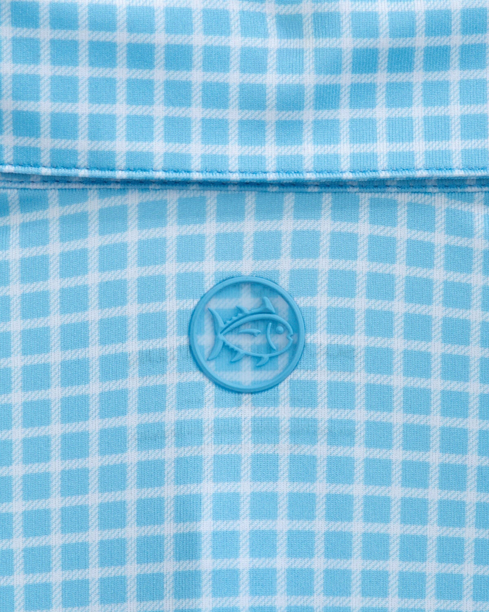 The detail view of the Southern Tide Driver Dunes Edge Team Colors Plaid Polo by Southern Tide - Rush Blue