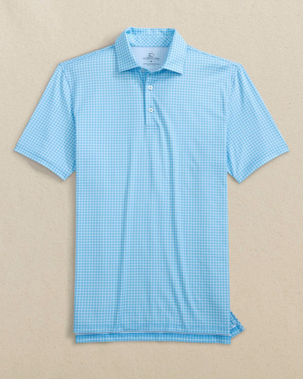 The front view of the Southern Tide Driver Dunes Edge Team Colors Plaid Polo by Southern Tide - Rush Blue