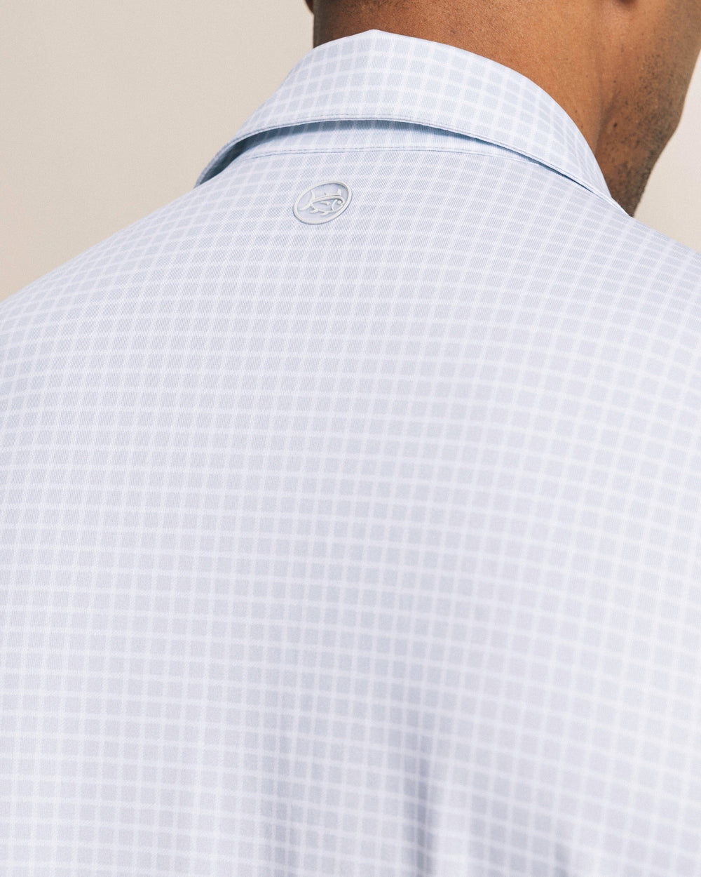 The back detail view of the Southern Tide Driver Dunes Edge Team Colors Plaid Polo by Southern Tide - Slate Grey