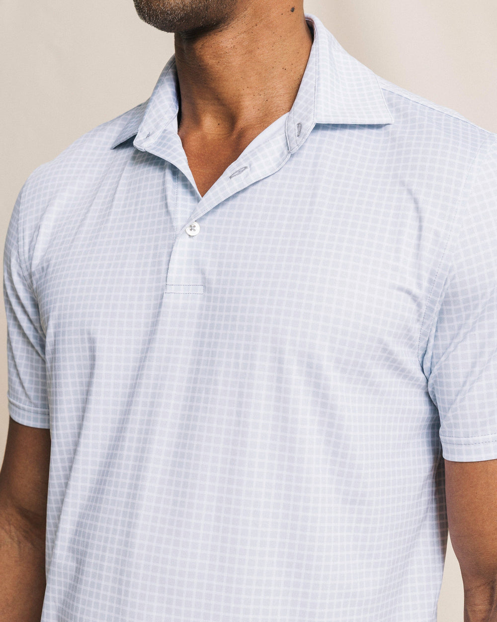 The front detail view of the Southern Tide Driver Dunes Edge Team Colors Plaid Polo by Southern Tide - Slate Grey