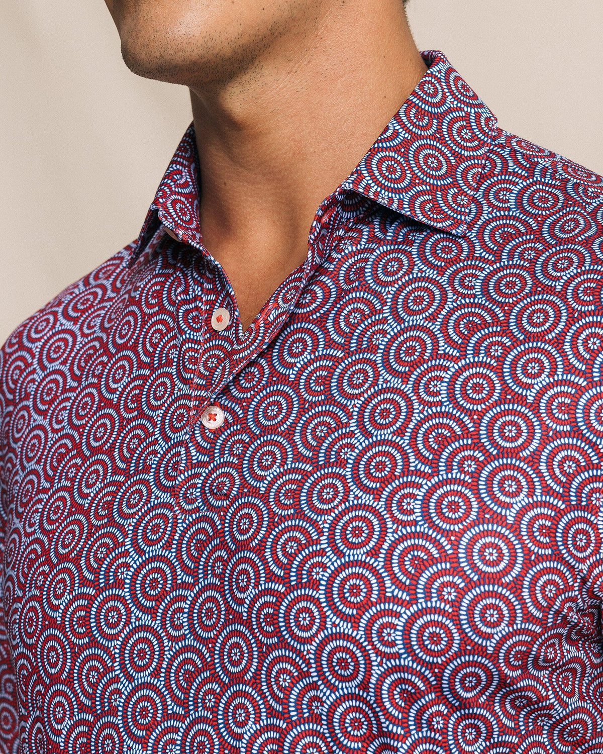 The detail view of the Southern Tide Driver Fireworks Printed Polo by Southern Tide - Channel Marker Red