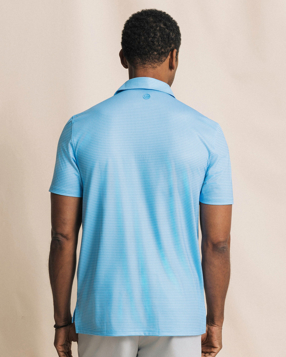 The back view of the Southern Tide Driver Getting Ziggy With It Printed Polo by Southern Tide - Ocean Channel