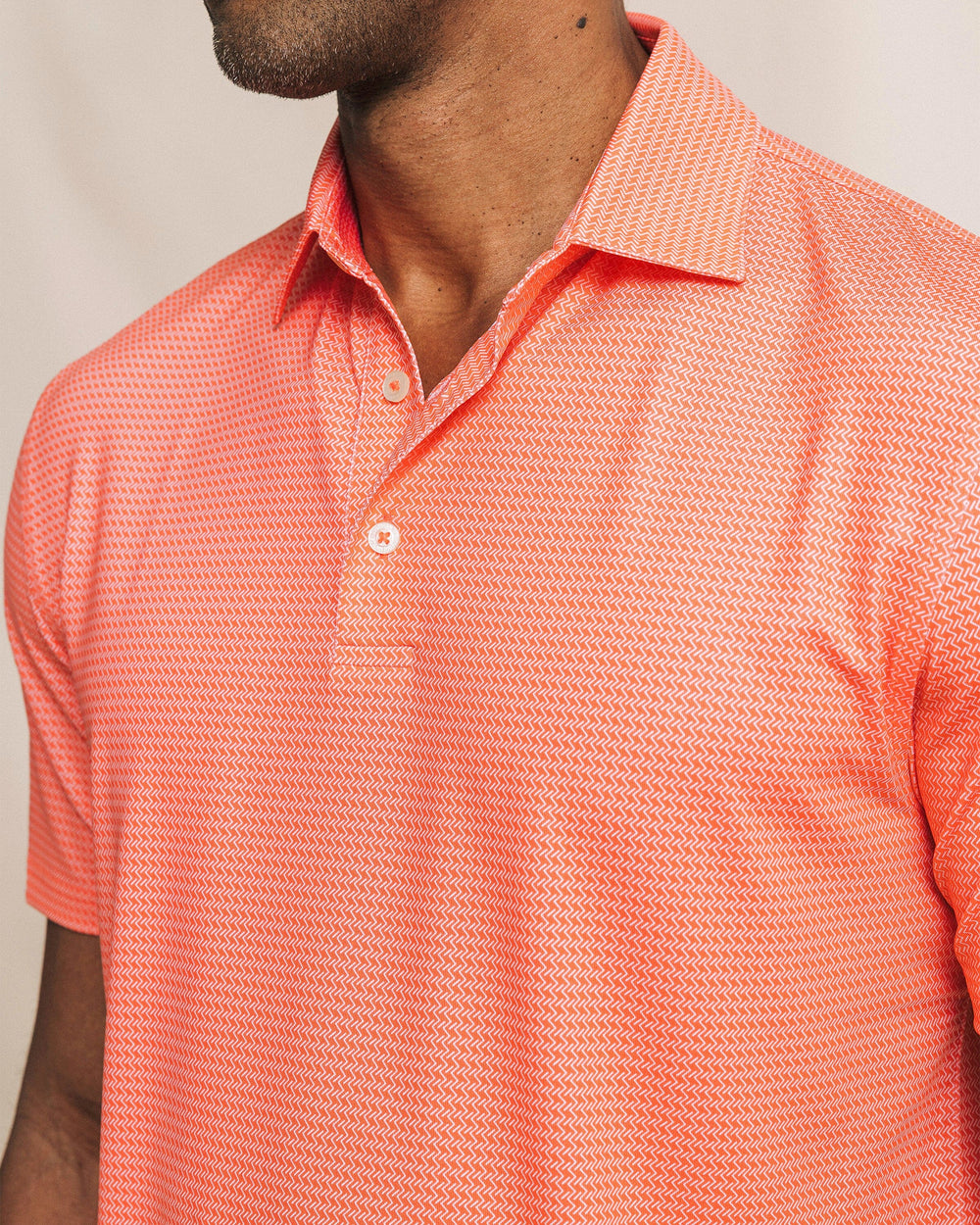 The detail view of the Southern Tide Driver Getting Ziggy With It Printed Polo by Southern Tide - Orange Blossom