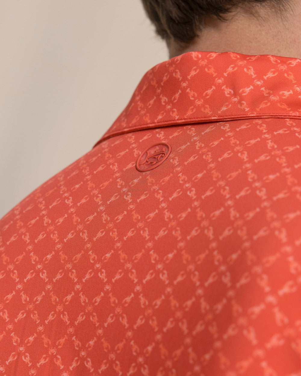 The detail view of the Southern Tide Driver Lobster Printed Polo by Southern Tide - Burnt Sienna