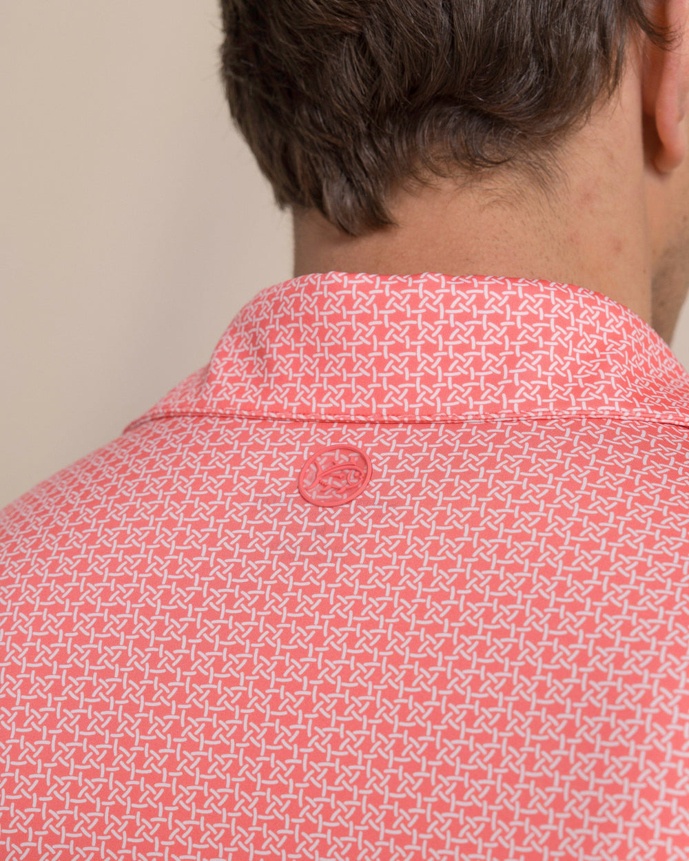 The detail view of the Southern Tide Driver Weaving Around Printed Polo by Southern Tide - Coral Beach