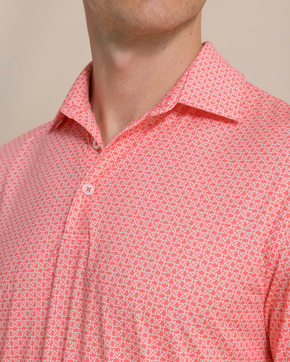 The detail view of the Southern Tide Driver Weaving Around Printed Polo by Southern Tide - Coral Beach