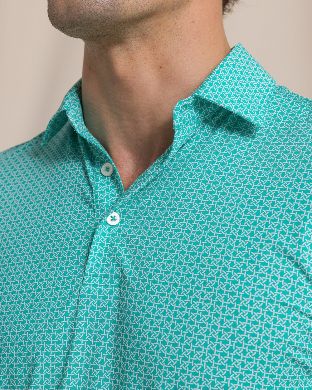 The detail view of the Southern Tide Driver Weaving Around Printed Polo by Southern Tide - Persian Green