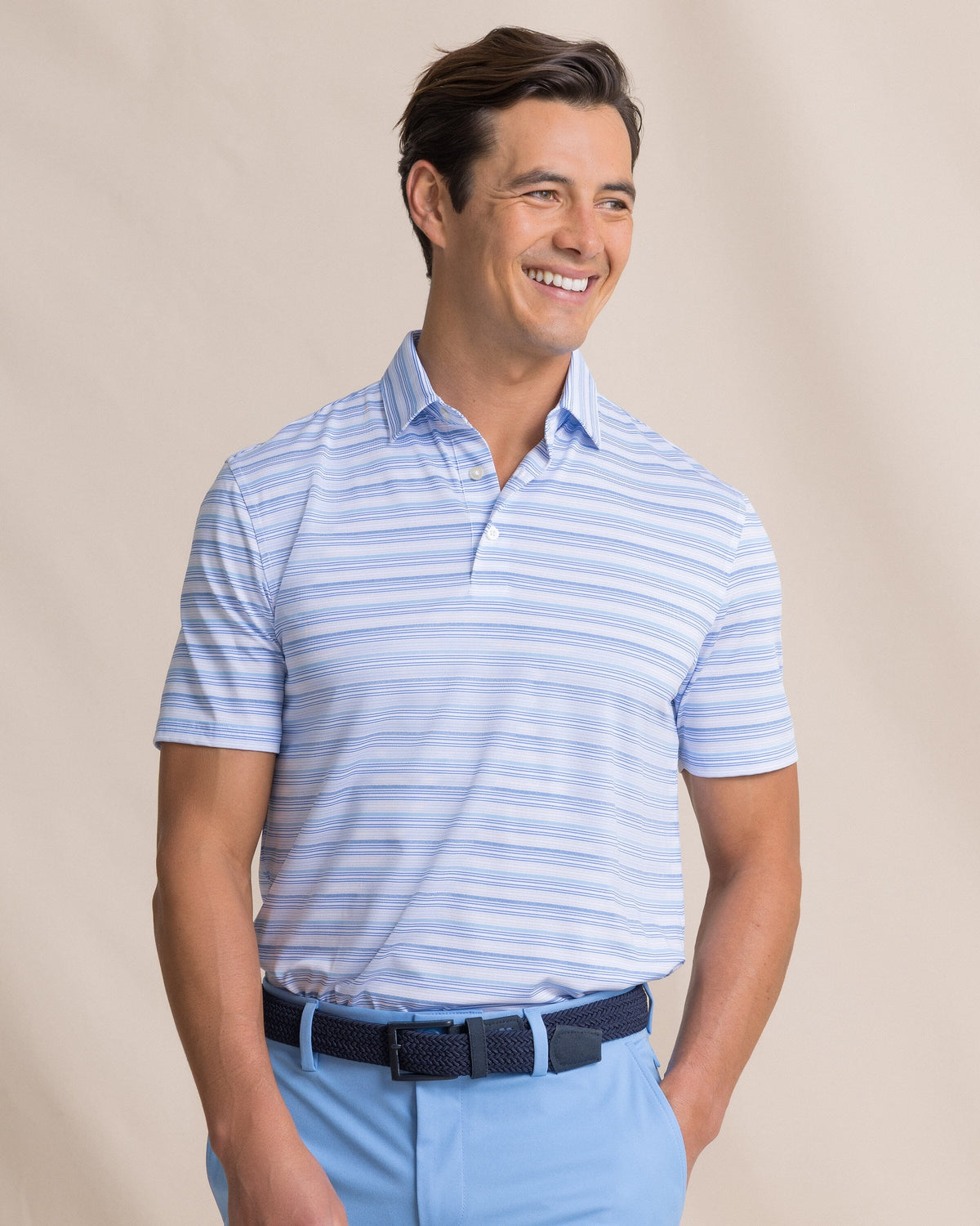 The front view of the Southern Tide Driver Wild Winds Stripe Polo by Southern Tide - Heather Blue Stream