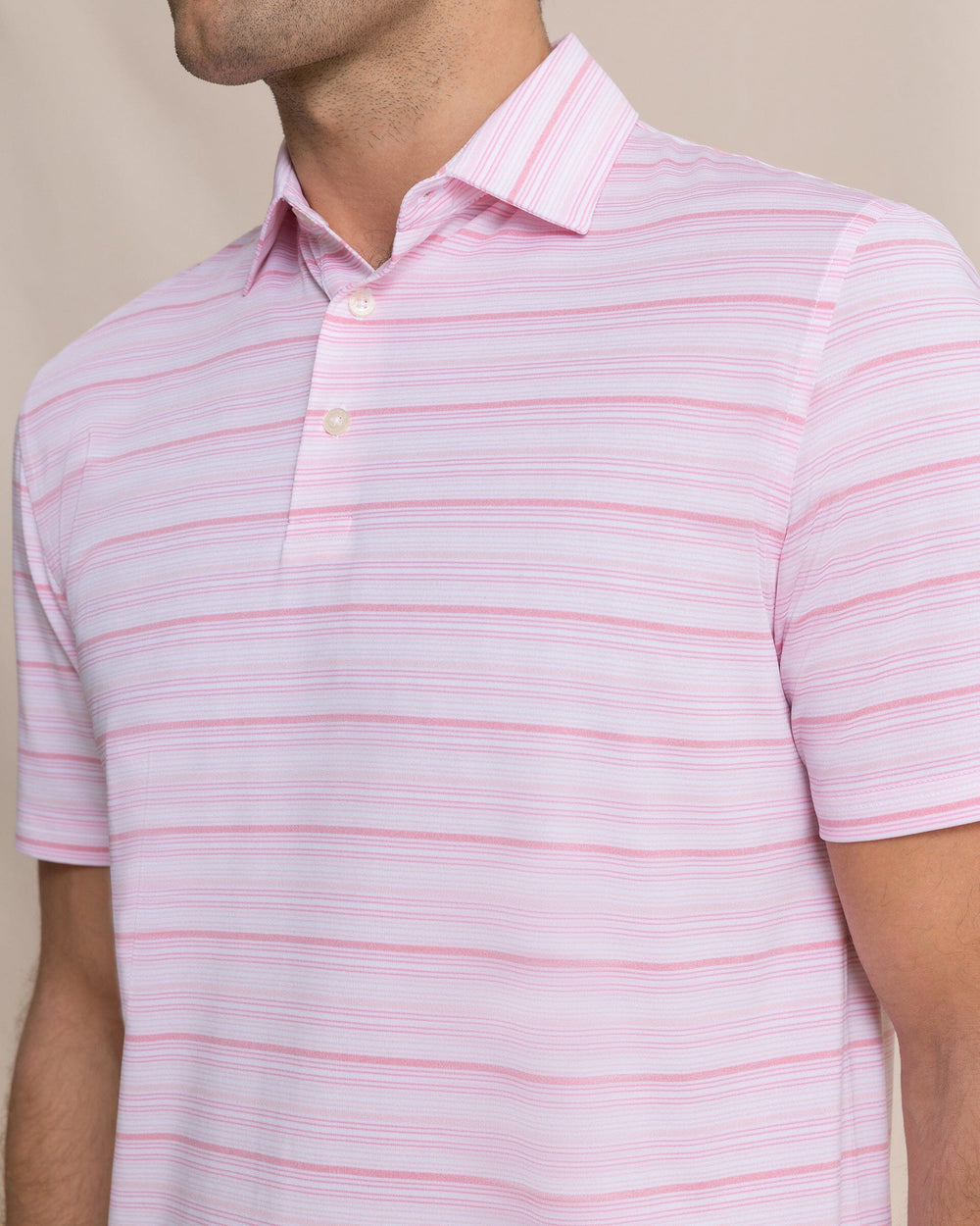 The detail view of the Southern Tide Driver Wild Winds Stripe Polo by Southern Tide - Heather Sea Pink