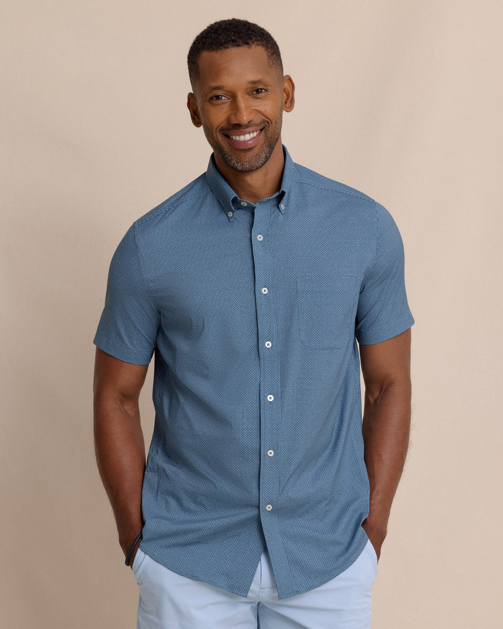 The front view of the Southern Tide Eastport Heather brrr°® Intercoastal Short Sleeve Sport Shirt by Southern Tide - Dress Blue