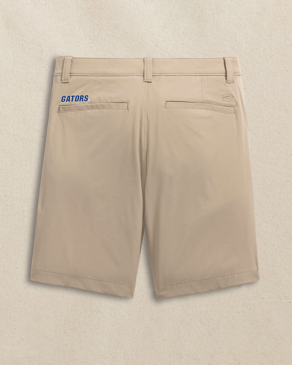 The back view of the Southern Tide Florida Gators brrr°®-die 8" Performance Short by Southern Tide - Sandstone Khaki