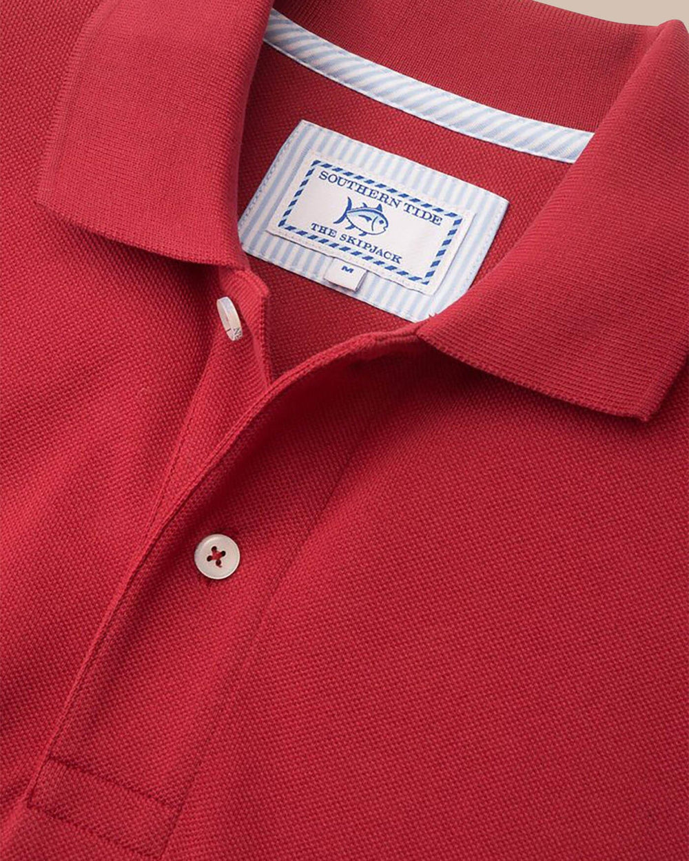 The detail view of the Southern Tide Alabama Crimson Tide Pique Polo Shirt by Southern Tide - Crimson