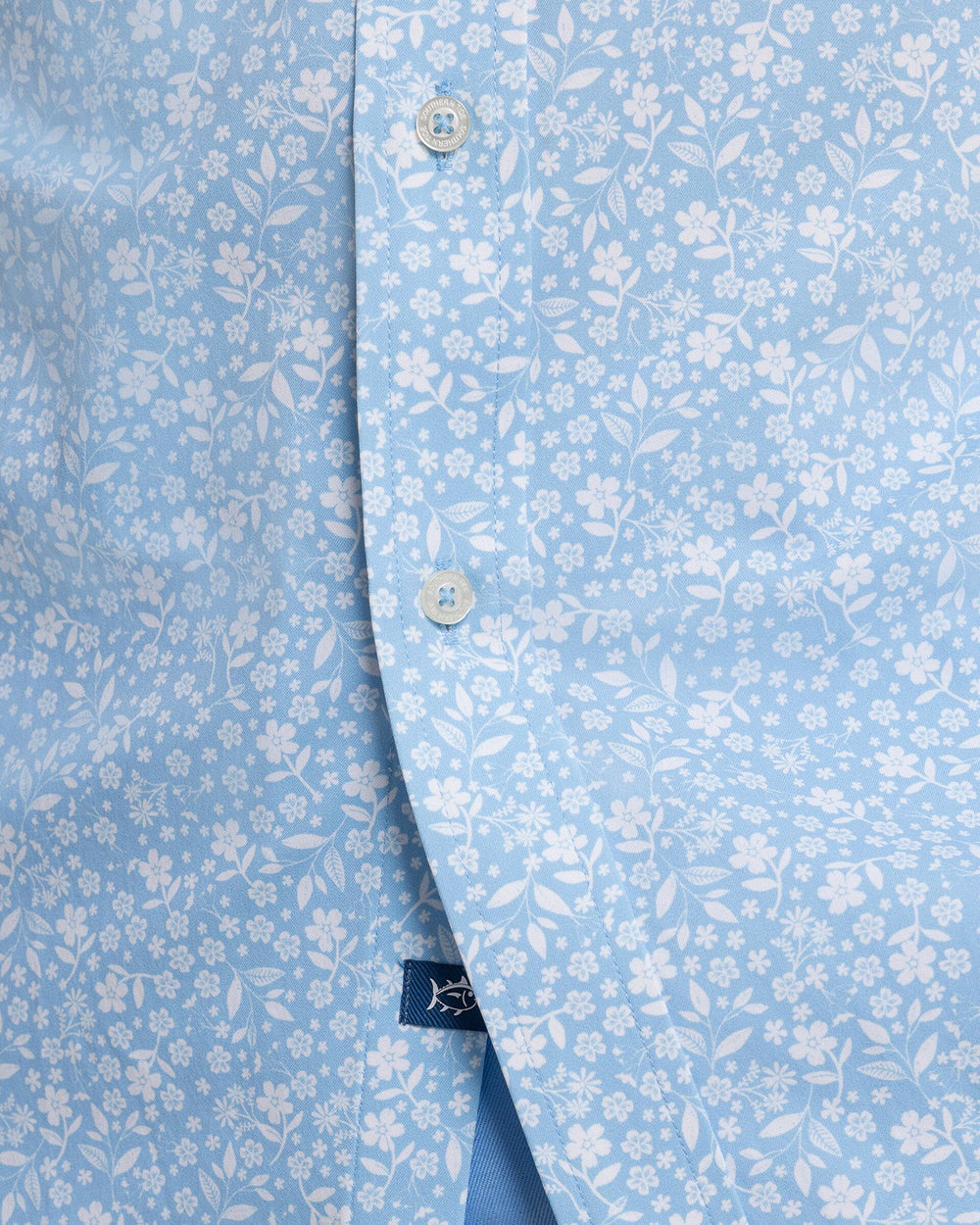 The detail view of the Southern Tide Garden Blooms Coastal Breeze® Short Sleeve Sport Shirt by Southern Tide - Tide Blue