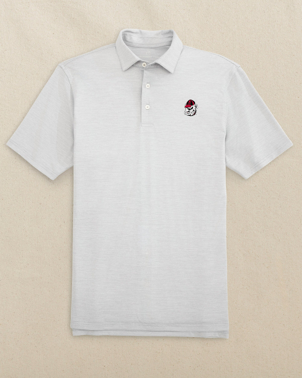 The front view of the Southern Tide Georgia Bulldogs Head Driver Spacedye Polo by Southern Tide - Slate Grey