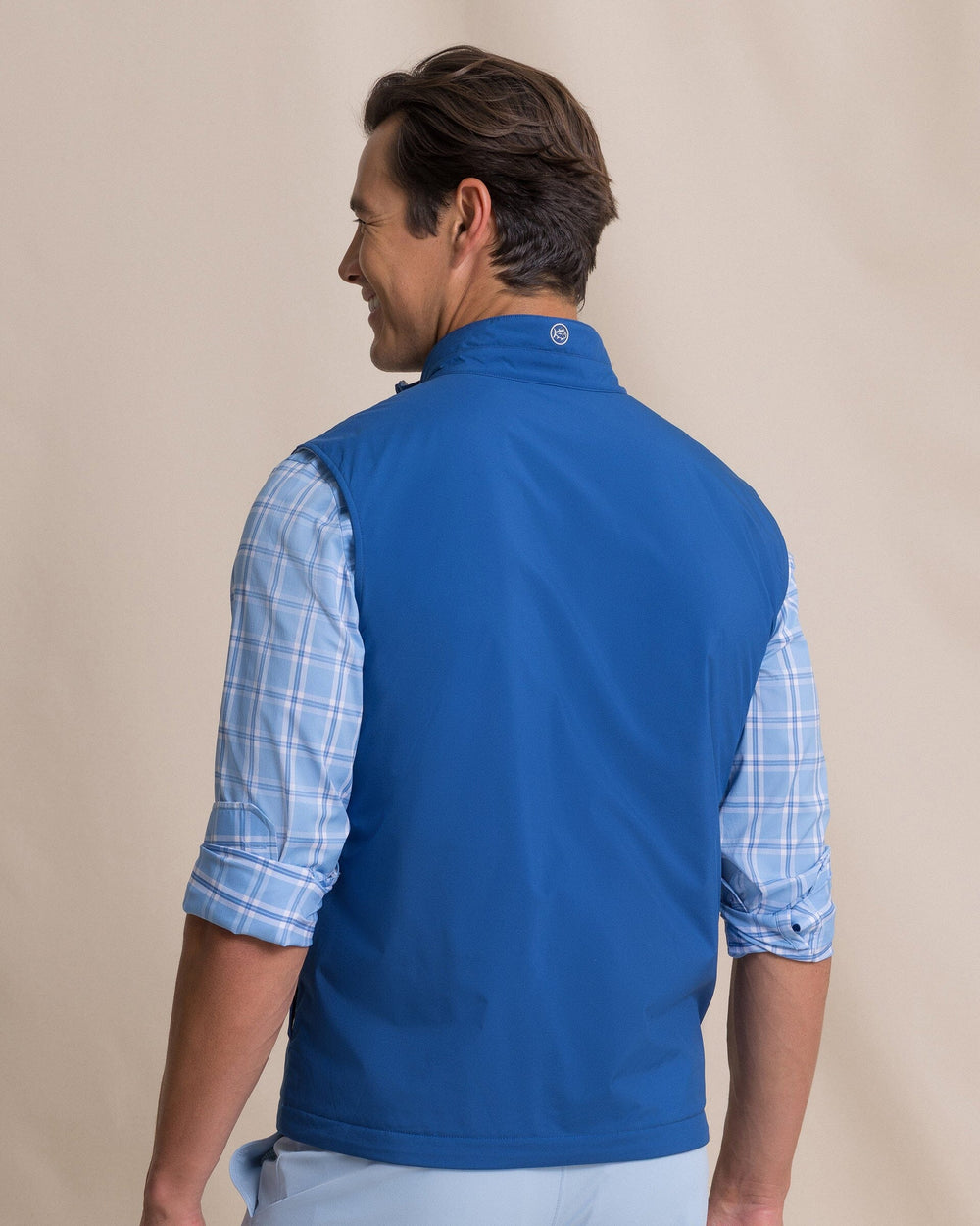The back view of the Southern Tide Harbor Reversible Vest by Southern Tide - Nautical Blue