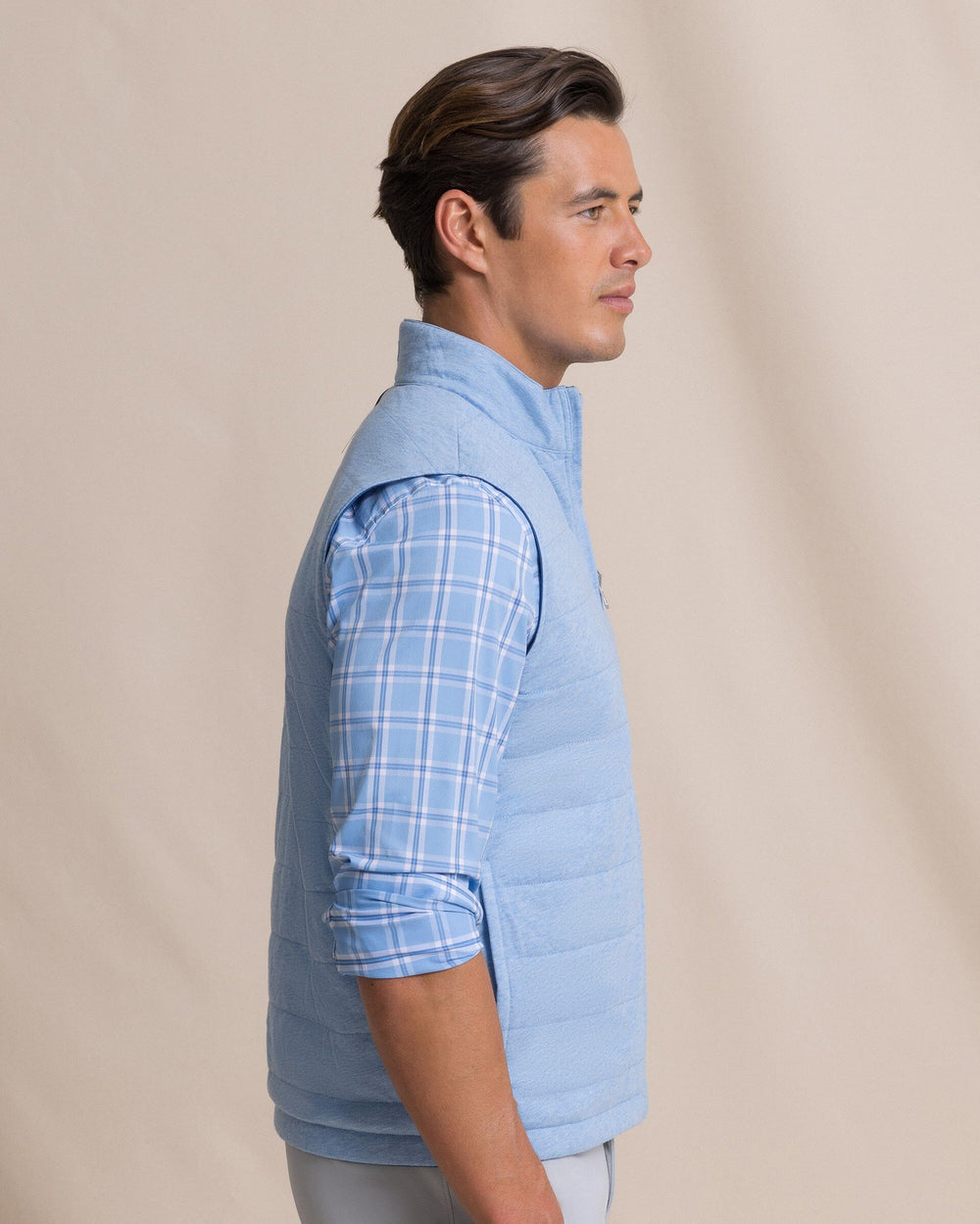 The side view of the Southern Tide Harbor Reversible Vest by Southern Tide - Nautical Blue