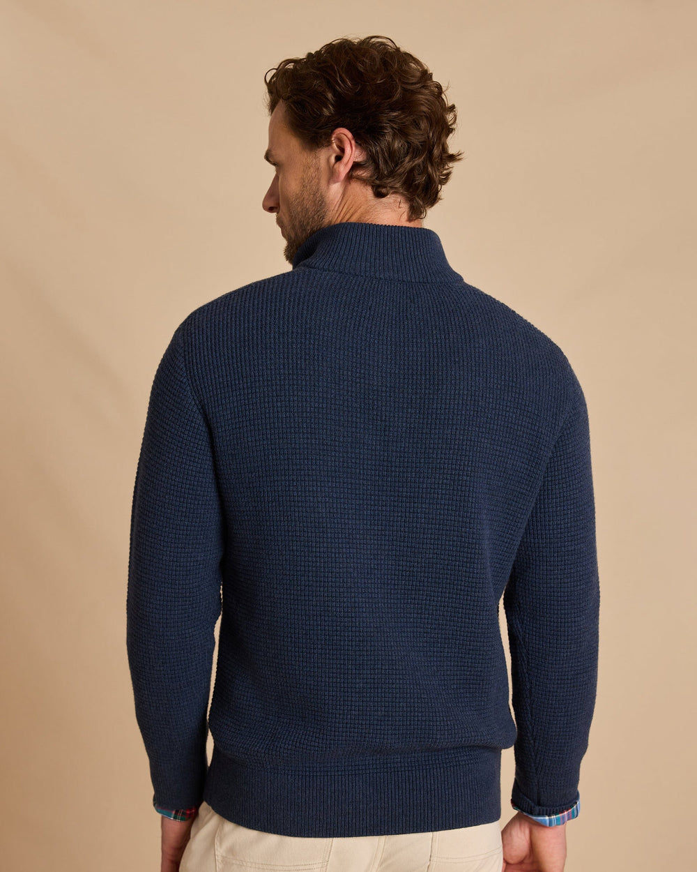 The back view of the Southern Tide Heather Quarter Button Sweater by Southern Tide - Heather Dress Blue