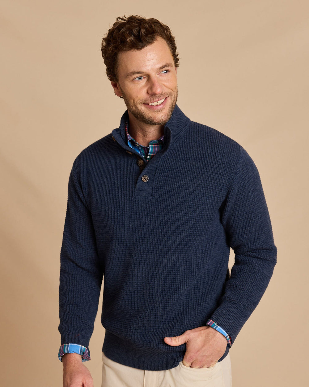 The front view of the Southern Tide Heather Quarter Button Sweater by Southern Tide - Heather Dress Blue