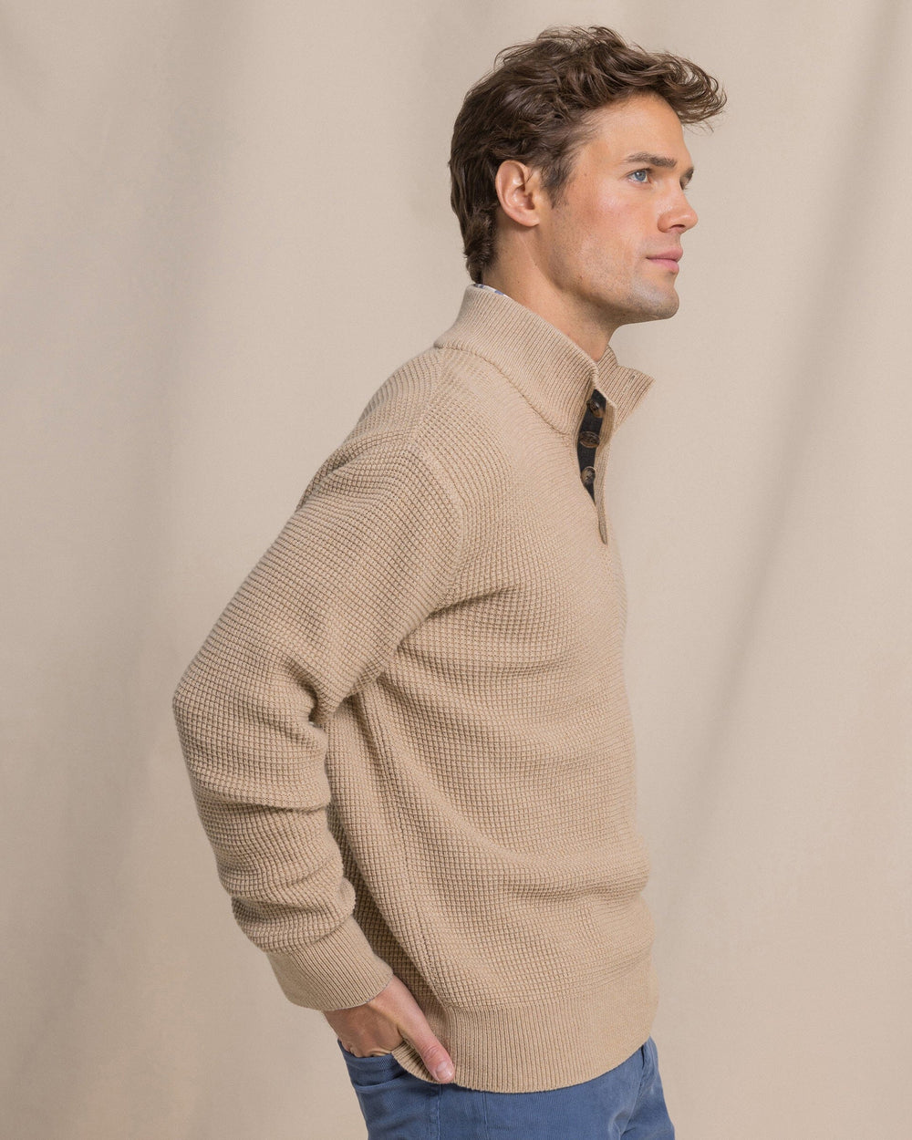 The side view of the Southern Tide Heather Quarter Button Sweater by Southern Tide - Heather Tannin