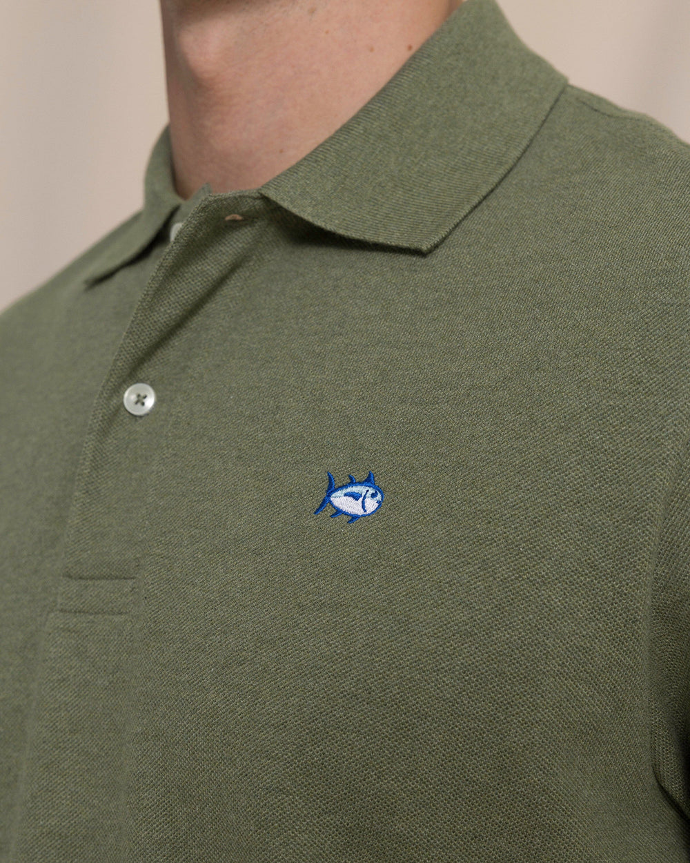 The detail view of the Southern Tide Heather Skipjack Polo by Southern Tide - Heather Cedar Green