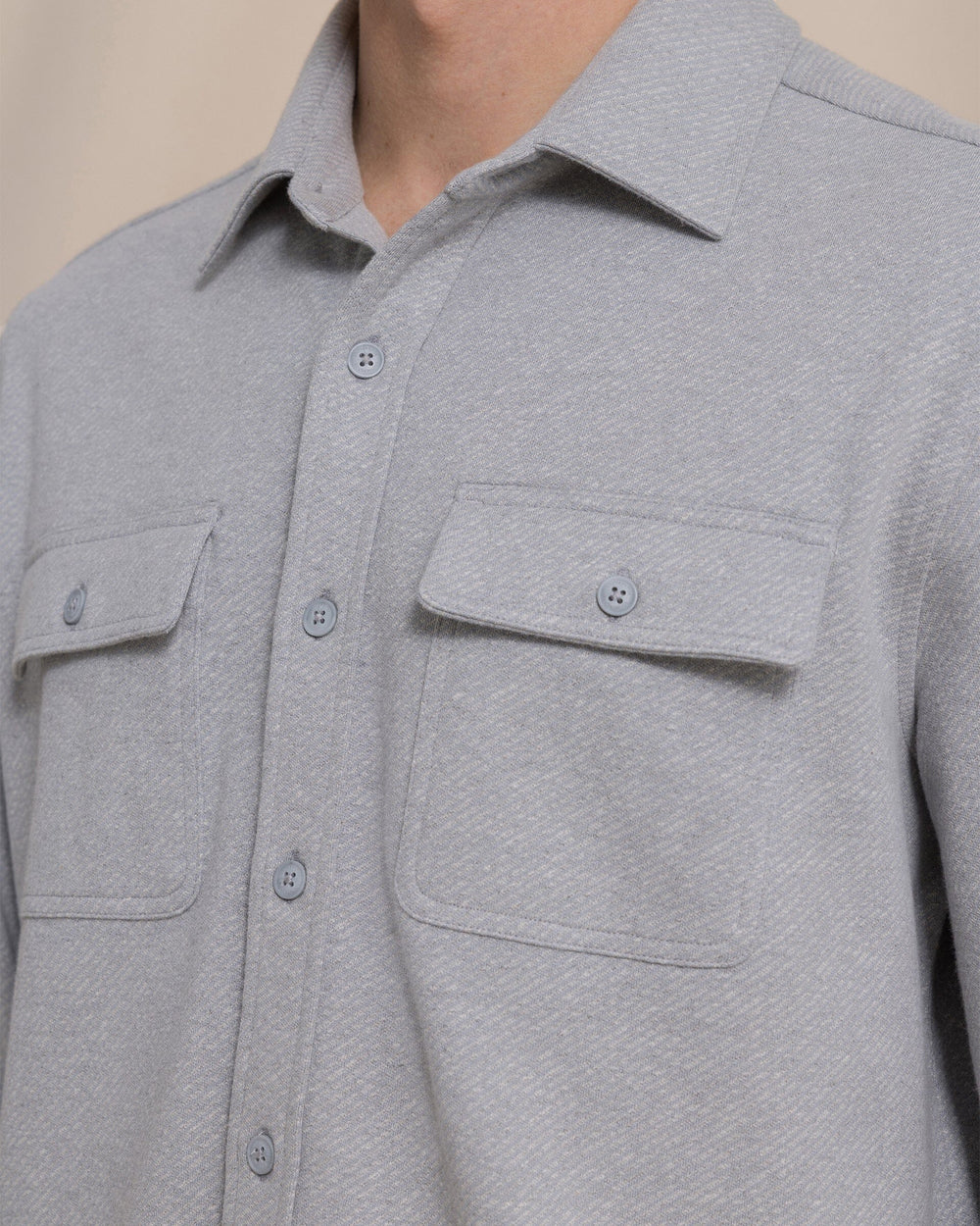 The detail view of the Southern Tide Heather Twill Knit Shacket by Southern Tide - Heather Grey