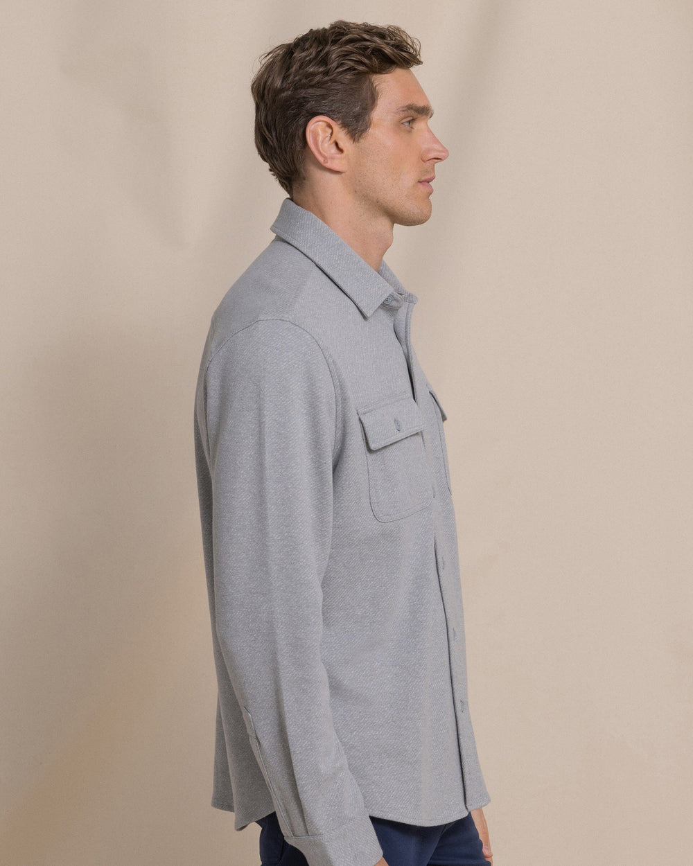 The side view of the Southern Tide Heather Twill Knit Shacket by Southern Tide - Heather Grey
