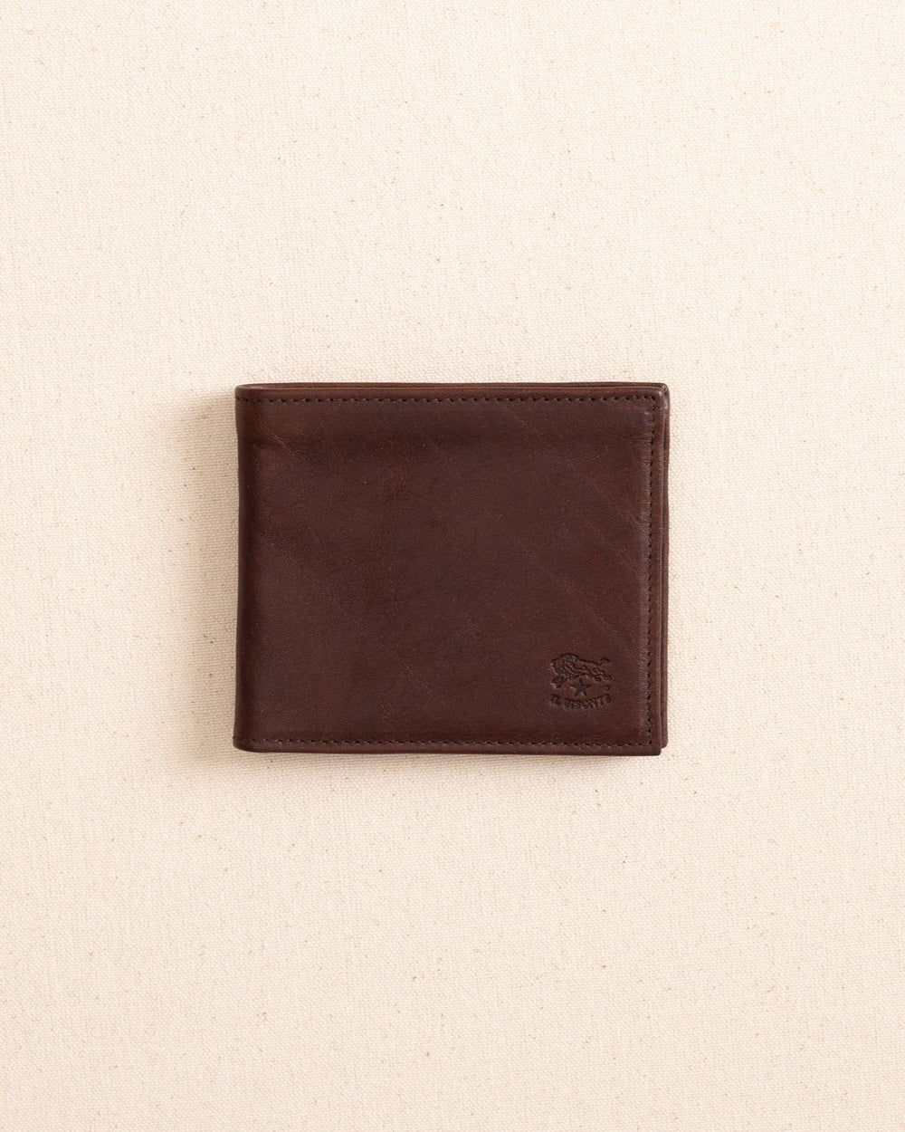 The front view of the Il Bisonte Classic Bifold Wallet at Southern Tide - Coffee