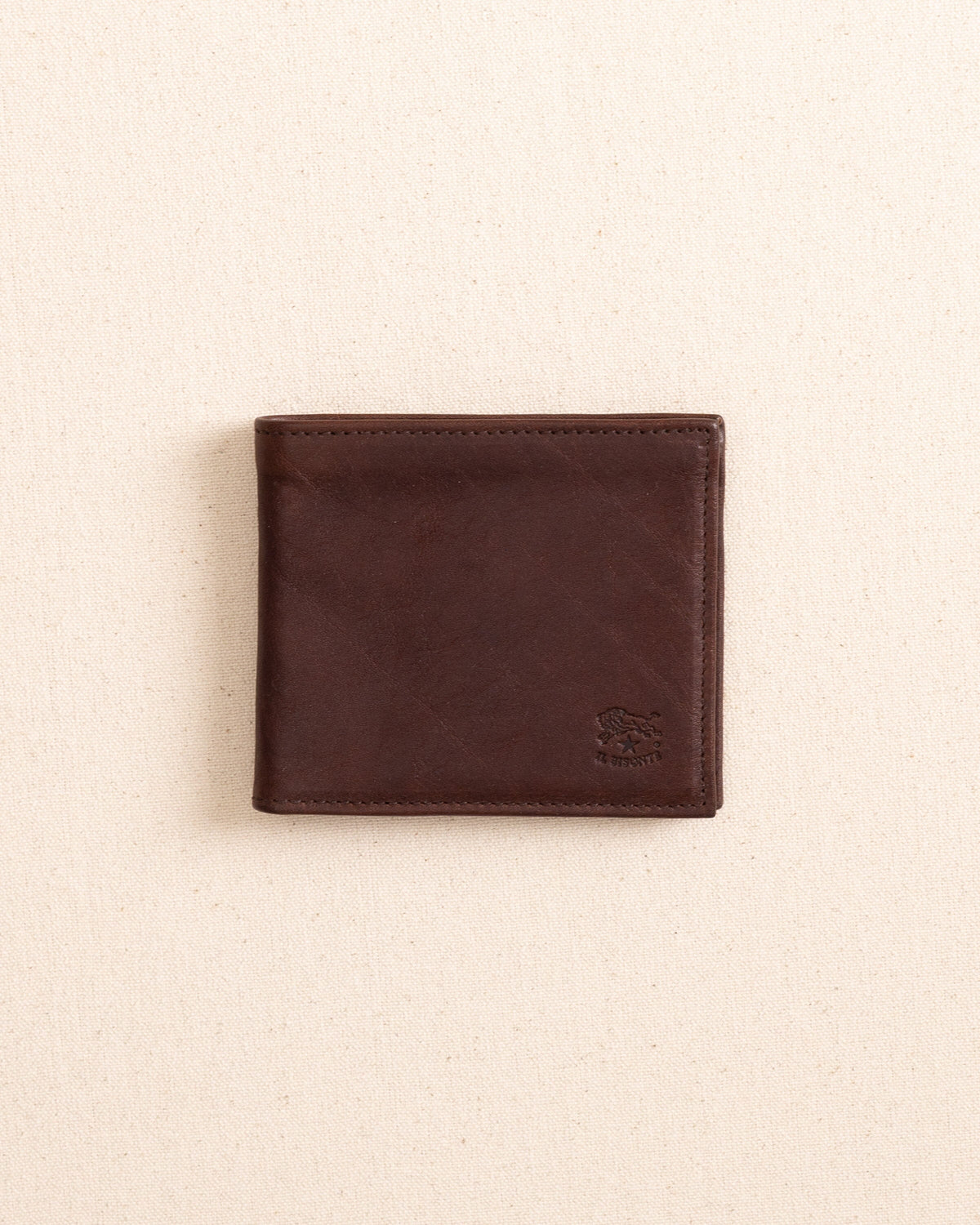 The front view of the Il Bisonte Classic Bifold Wallet at Southern Tide - Coffee