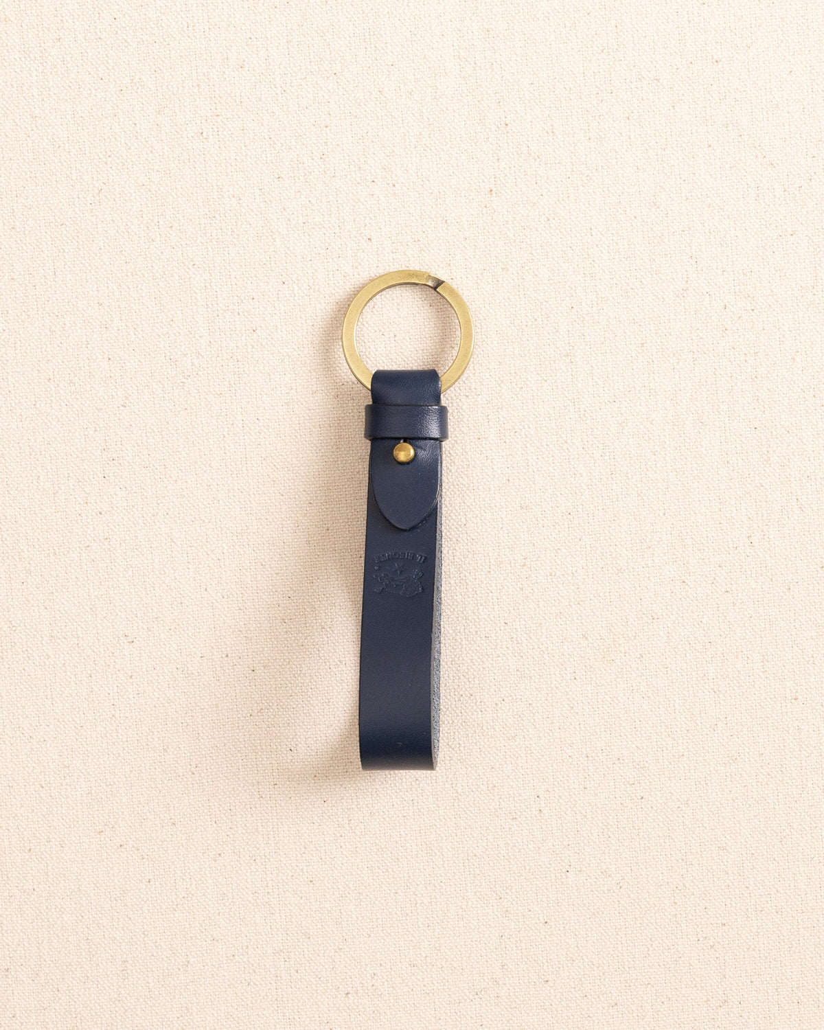 The front view of the Il Bisonte Classic Key Fob at Southern Tide - Blue
