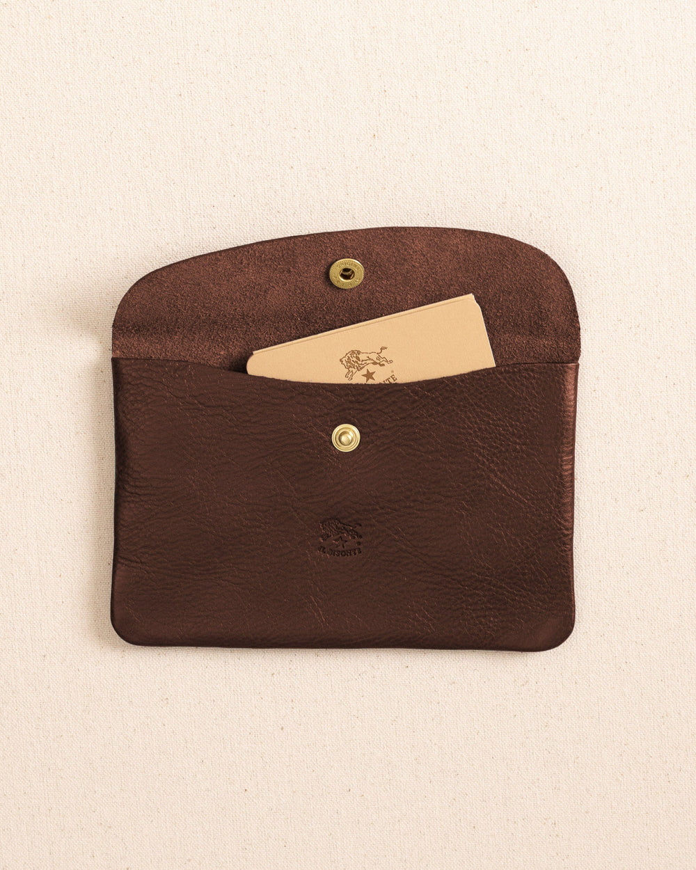 The open view of the Il Bisonte Leather Envelope Pouch at Southern Tide - Coffee