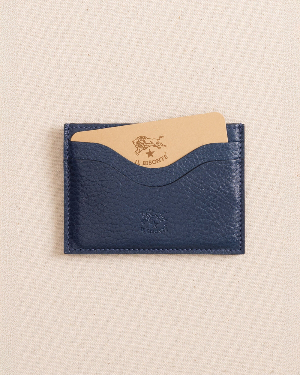 The front view of the Il Bisonte Salina Card Case at Southern Tide - Blue
