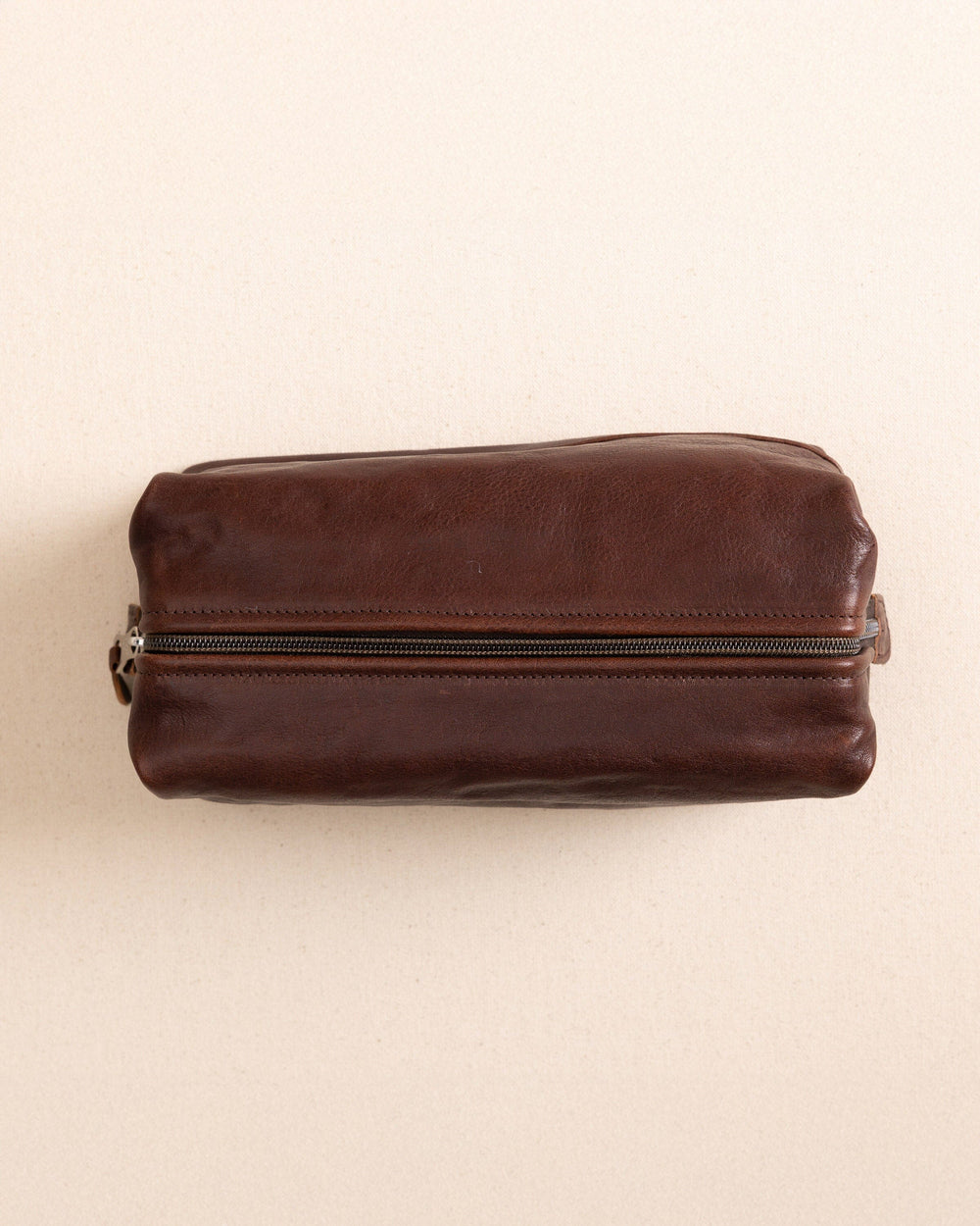 The top view of the Il Bisonte Travel Bag at Southern Tide - Coffee