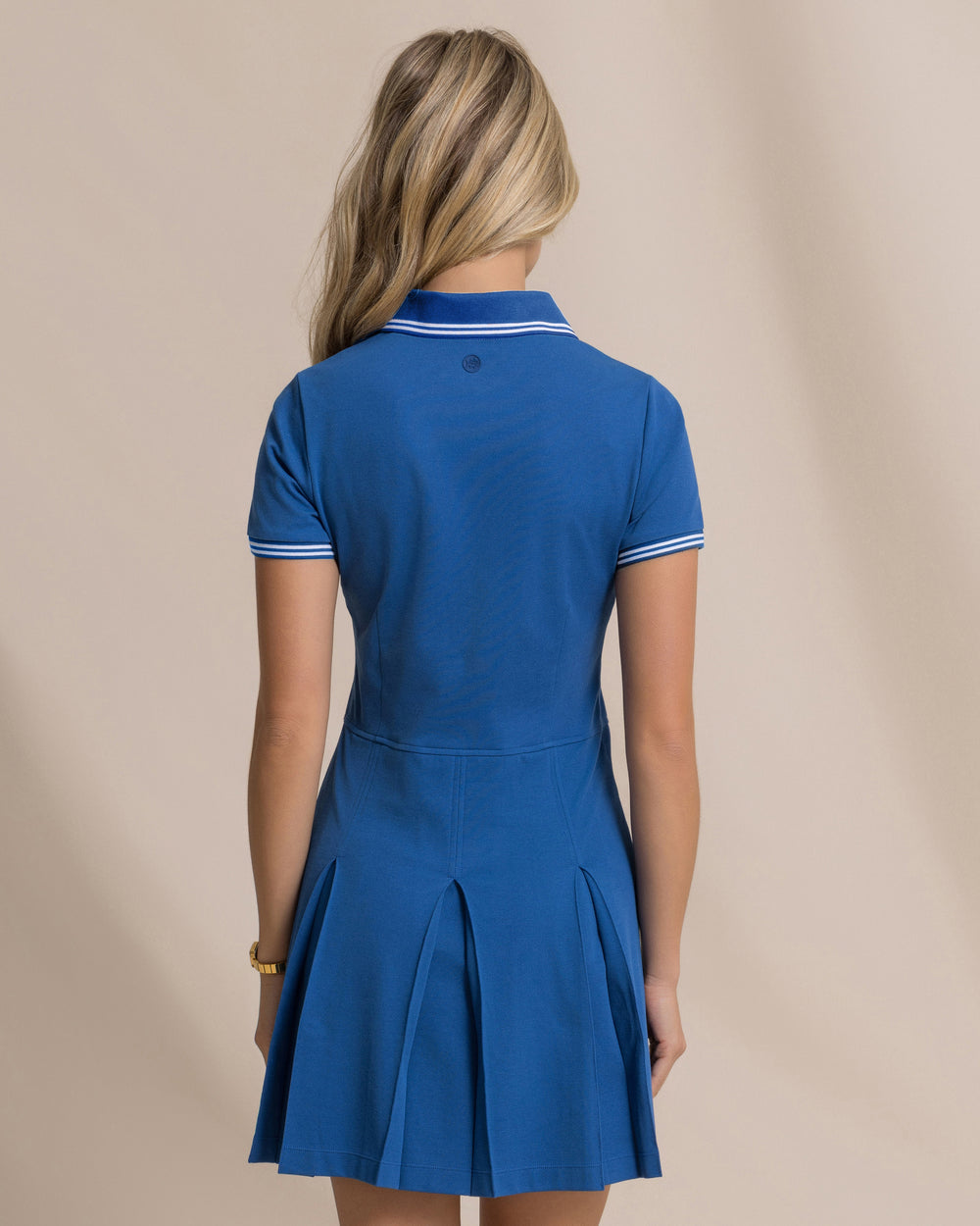 The back view of the Southern Tide Isabelle Solid Polo Active Dress by Southern Tide - Nautical Blue