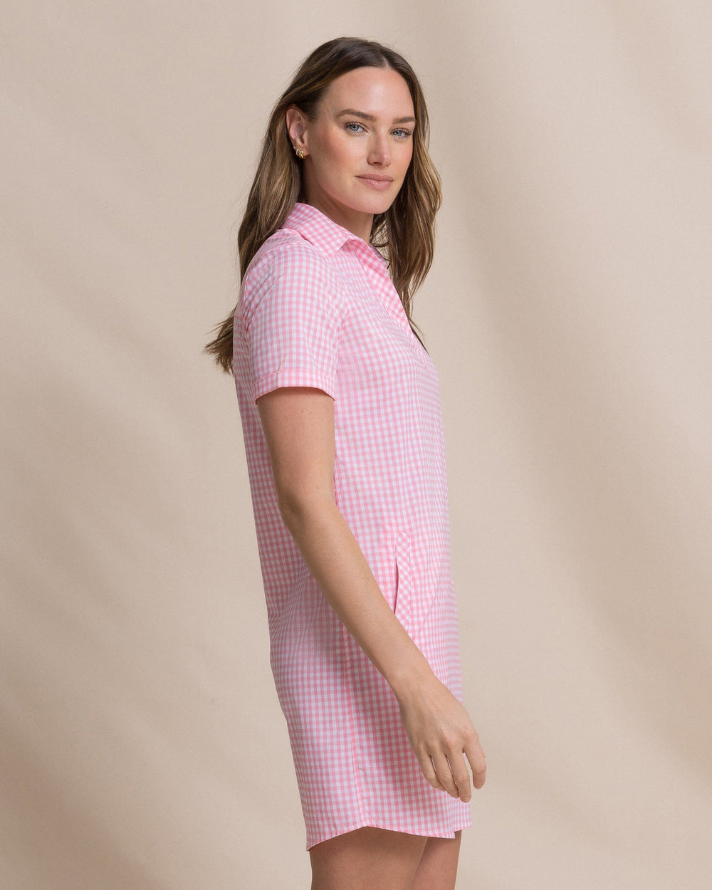 The side view of the Southern Tide Kamryn Gingham Coastal Breeze® Dress by Southern Tide - Sea Pink