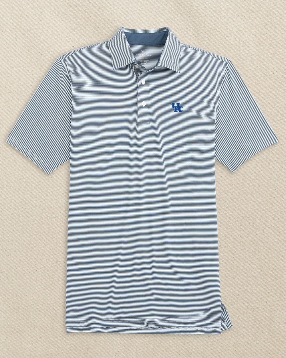 The front view of the Southern Tide Kentucky Wildcats brrr°®-eeze Meadowbrook Stripe Polo by Southern Tide - Aged Denim