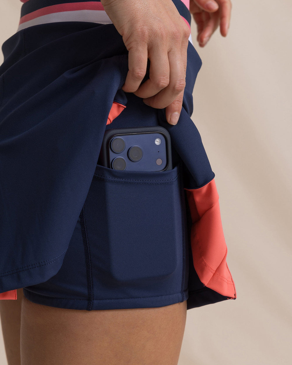The detail view of the Southern Tide Kiki Pleated Active Skort by Southern Tide - Dress Blue