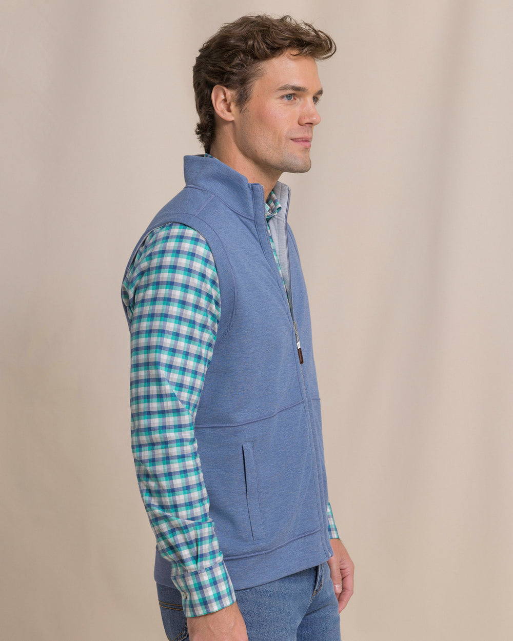 The side view of the Southern Tide Lightweight Knit Heather Reversible Vest by Southern Tide - Heather Anchor Grey