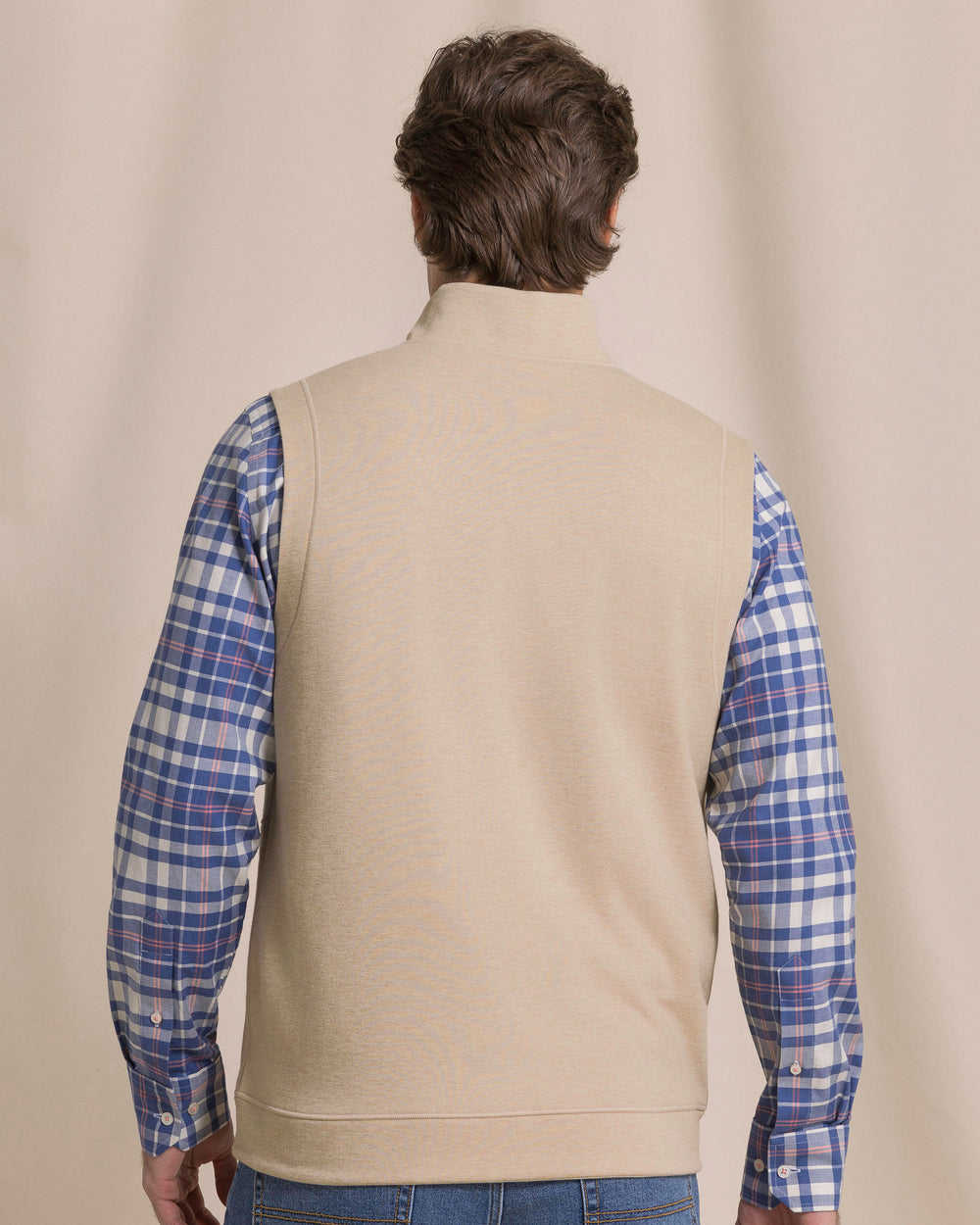 The back view of the Southern Tide Lightweight Knit Heather Reversible Vest by Southern Tide - Heather Sandstone Khaki