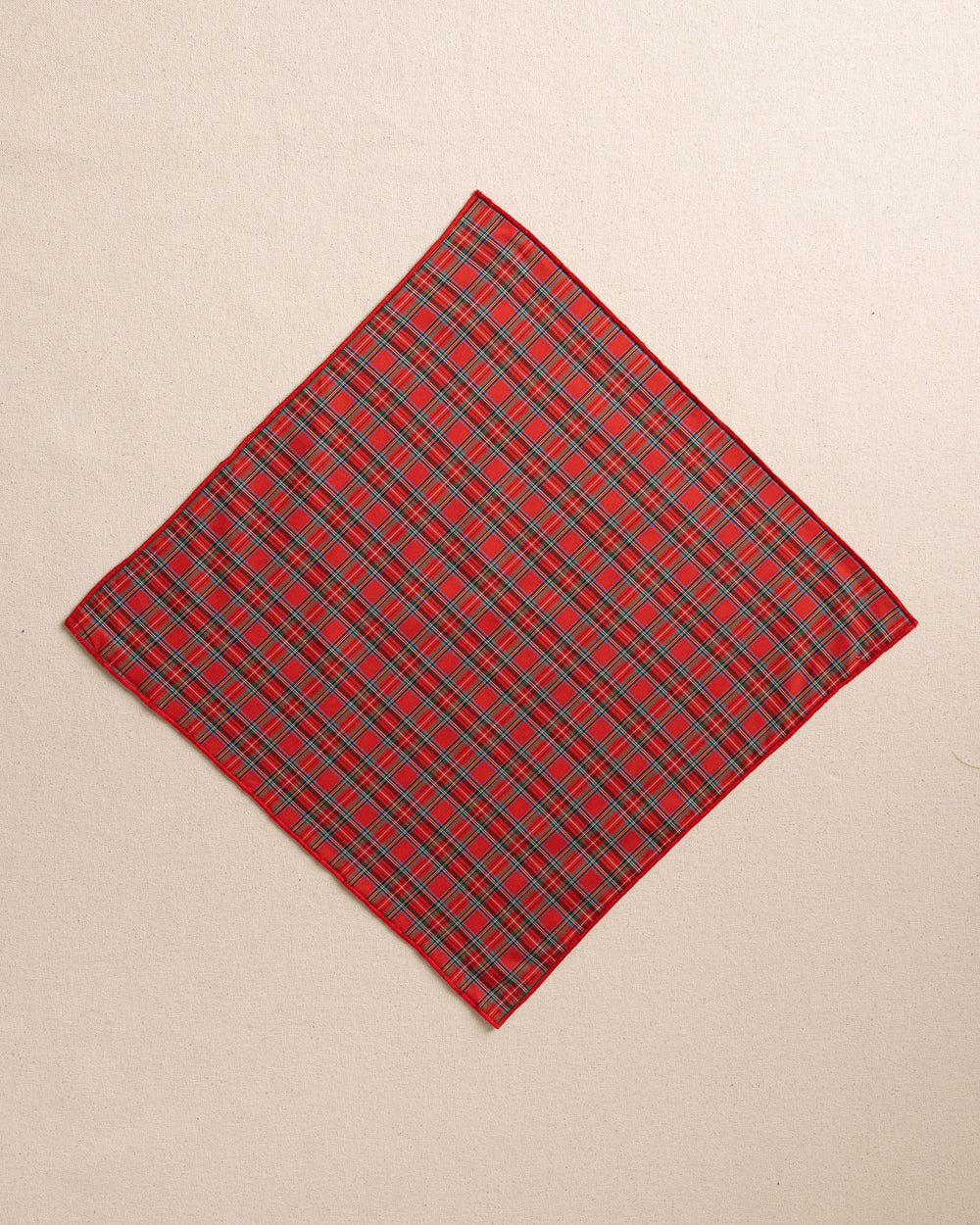 The front view of the High Cotton MacIntosh Tartan Pocket Square at Southern Tide - Red