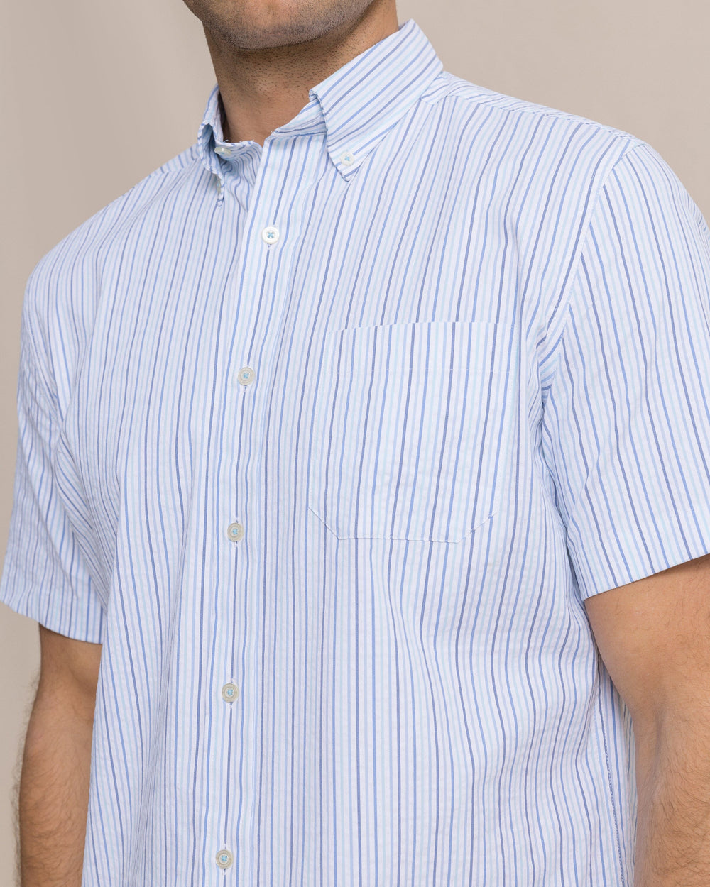 The detail view of the Southern Tide Marina Seersucker Coastal Breeze® Short Sleeve Sport Shirt by Southern Tide - Tropical Breeze Blue