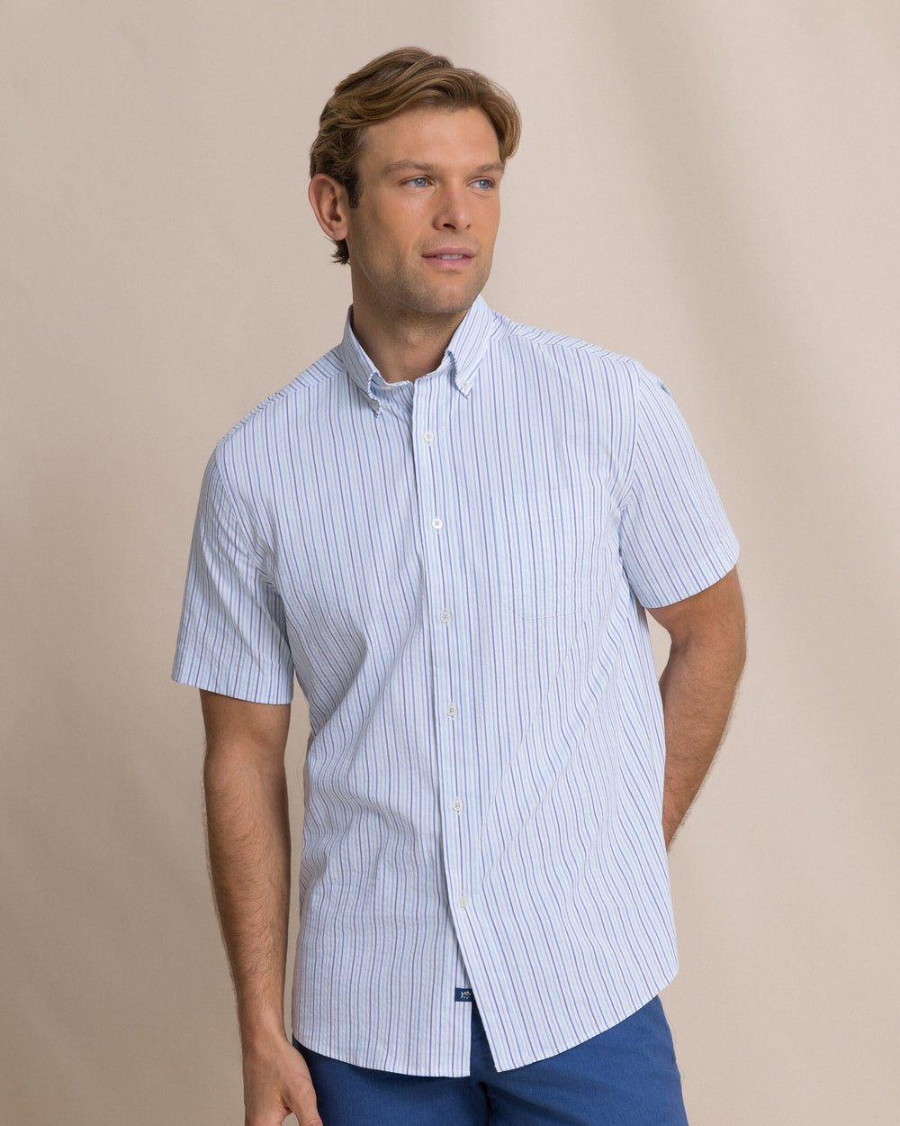 The front view of the Southern Tide Marina Seersucker Coastal Breeze® Short Sleeve Sport Shirt by Southern Tide - Tropical Breeze Blue